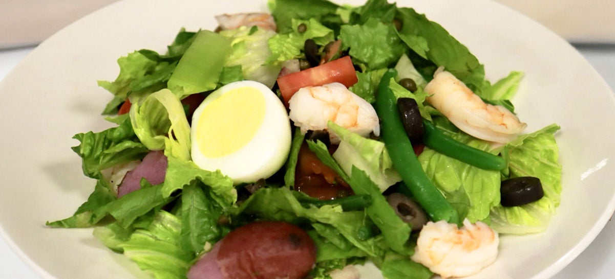 A photo of a salad.
