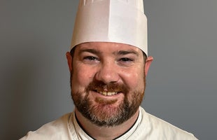 Smiling Man in Professional Outfit 