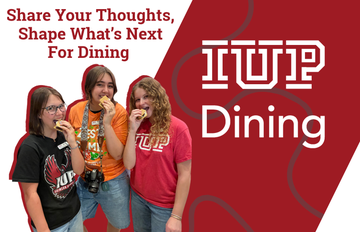 Three IUP students enjoying food next to the IUP dining logo