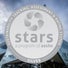 A silver "stars" seal from the Sustainability Tracking, Assessment & Rating System (AASHE) overlaid on a blurred image of the Malkin Sacks CommonsA silver "stars" seal from the Sustainability Tracking, Assessment & Rating System (AASHE) overlaid on a blurred image of the Malkin Sacks Commons.




A silver "stars" seal from the Sustainability Tracking, Assessment & Rating System (AASHE) overlaid on a blurred image of the Malkin Sacks Commons.




