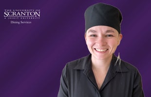 The University of Scranton Dining Services logo with image of Nikki Ash