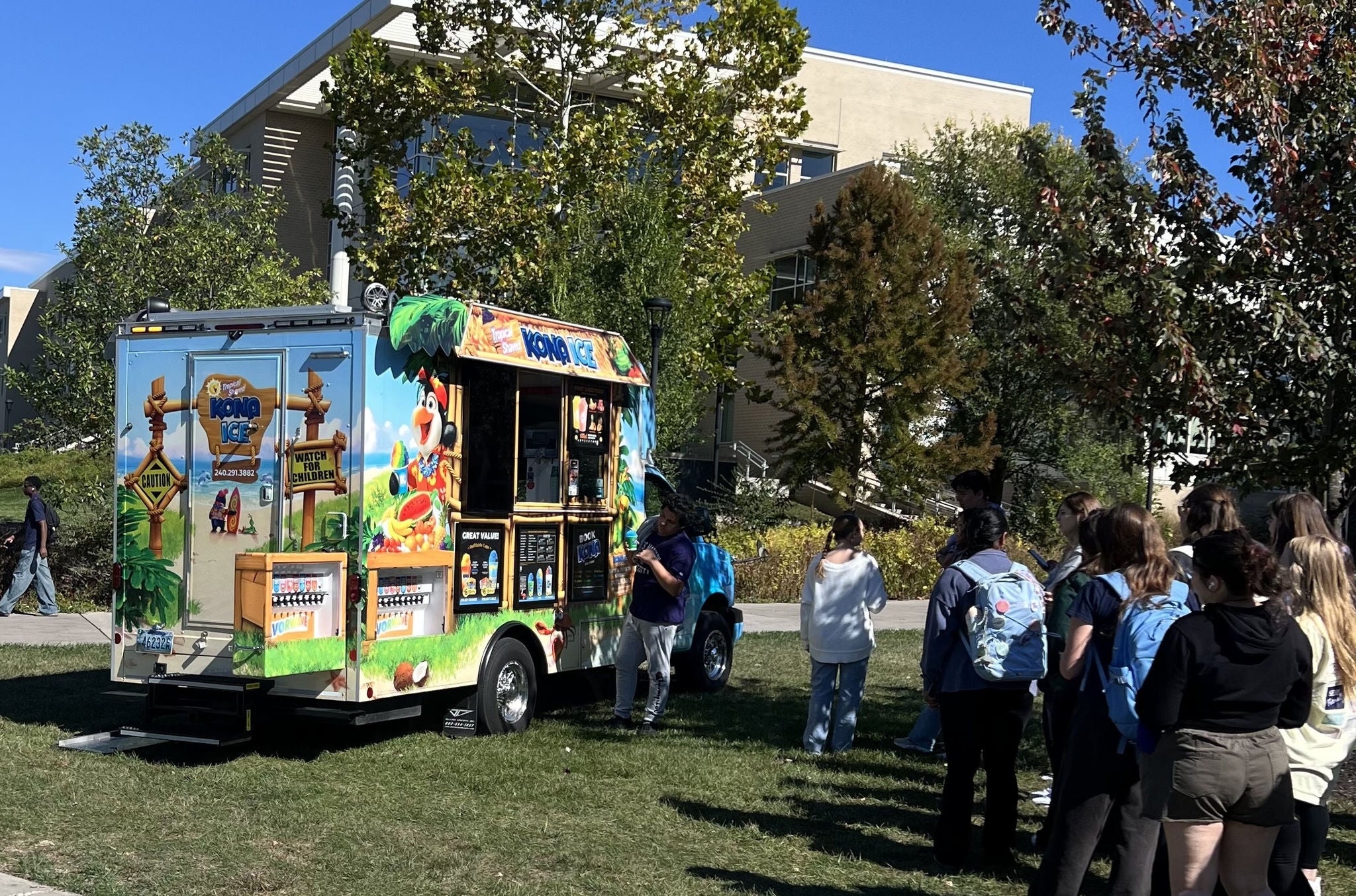 People standing in line for food truck