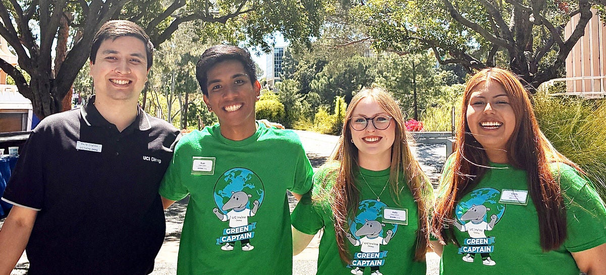UC Irvine's Sustainability coordinator smiling with the Green Captains.