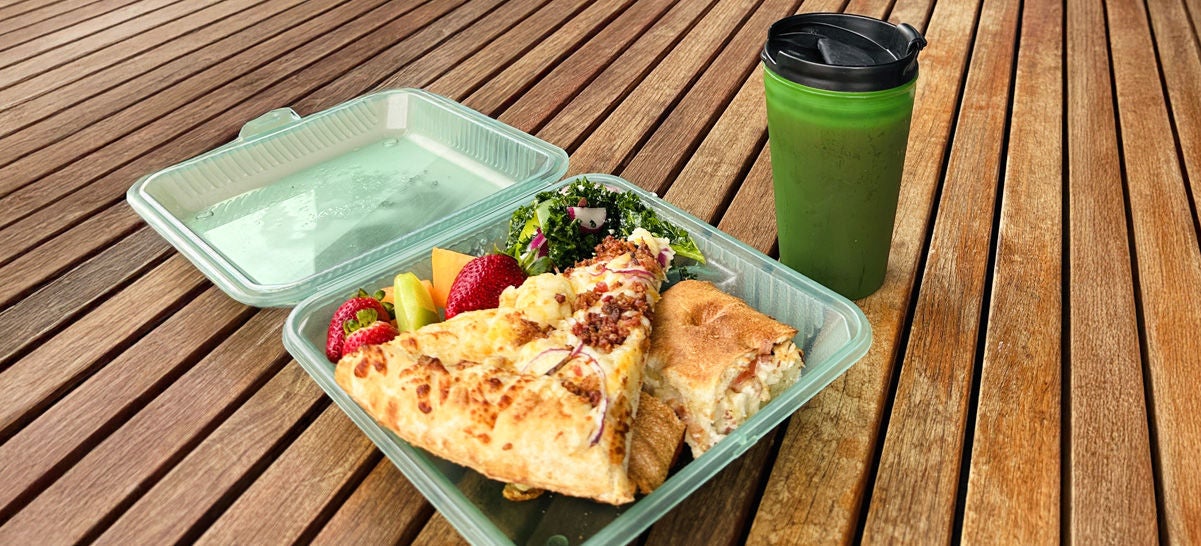 Reusable To-Go container with food in it.