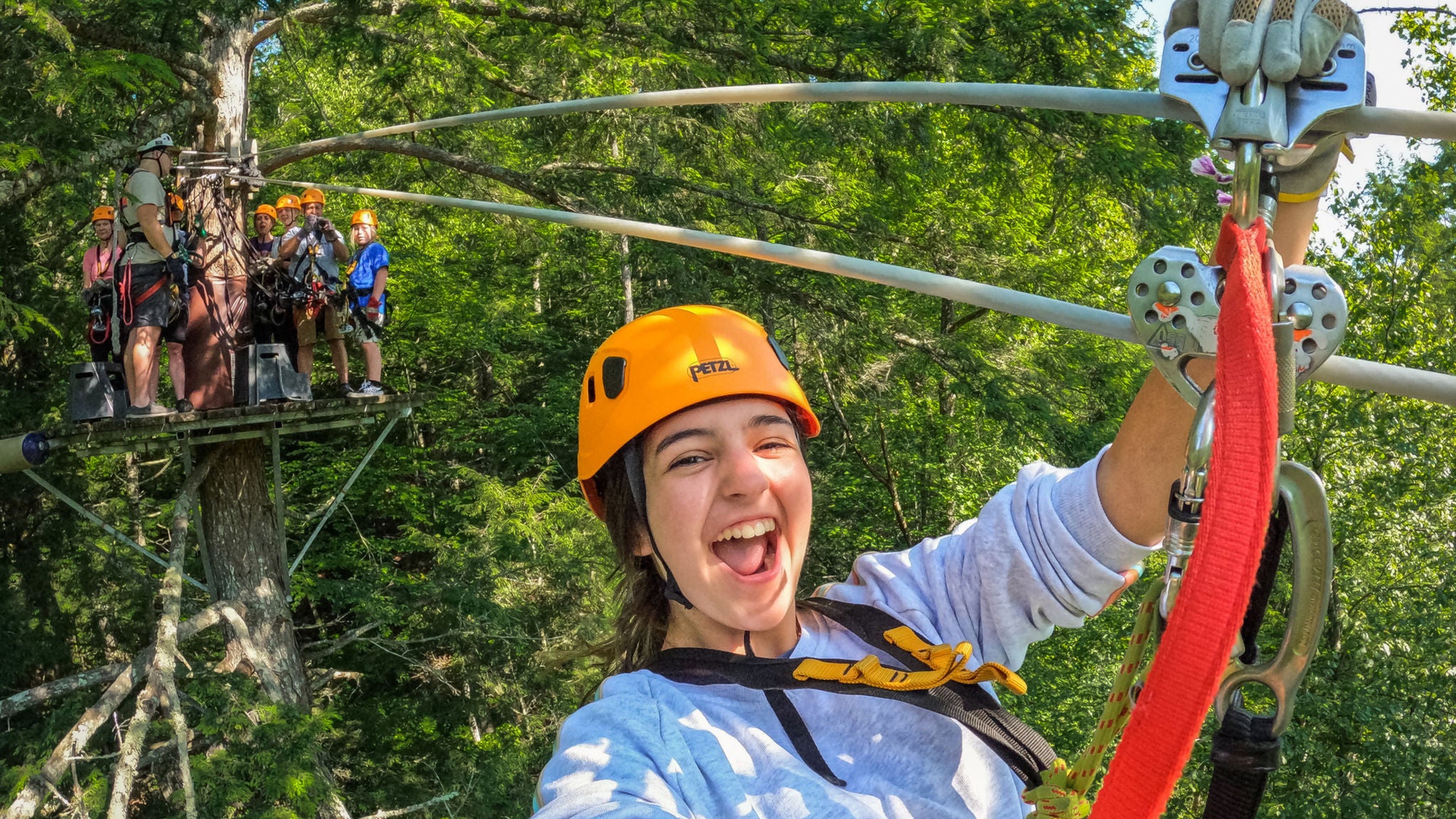 a picture of a person ziplining