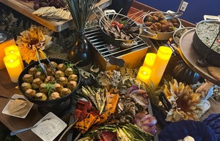 Catering buffet options on a decorated table spread.