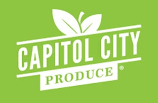 A logo for Capitol City Produce featuring white text and leaf icons against a solid vibrant green background.
