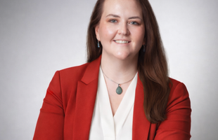 Smiling Women in Professional Outfit 